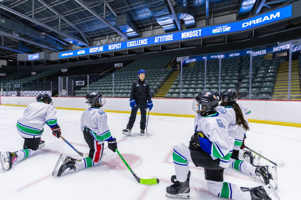Coach group session on ice